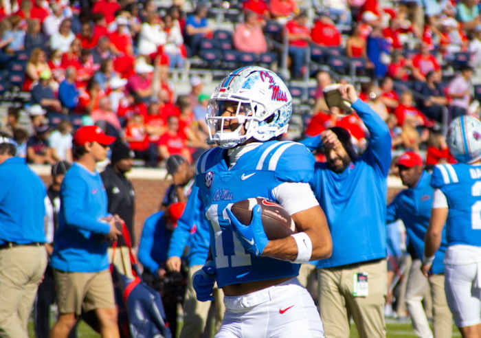 Ole Miss Rebels receiver Jordan Watkins on the field during pregame warmups versus the Texas A&M Aggies (2023).